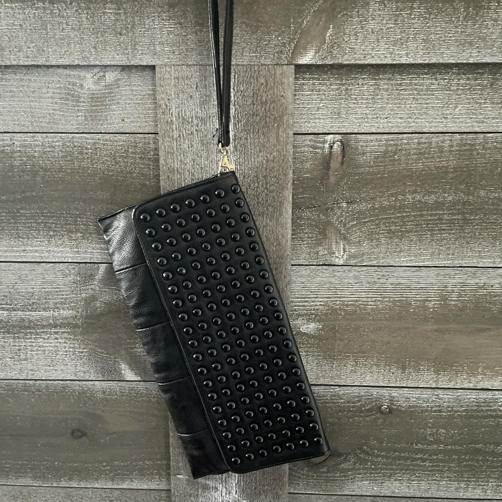 Black leather wristlet with beads and handle